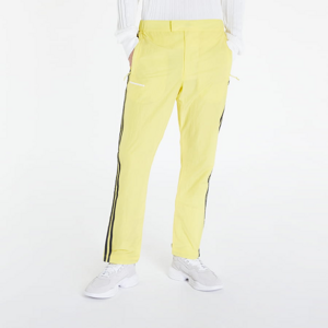 Šušťáky adidas x Pharrell Williams Shell Pants UNISEX Light Yellow