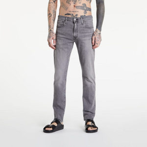 Jeans Levi's ® Slim Taper Jeans šedé / žlté